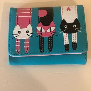 Three kitty women’s wallet. Brand new.